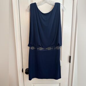 Navy blue cocktail dress with beading.